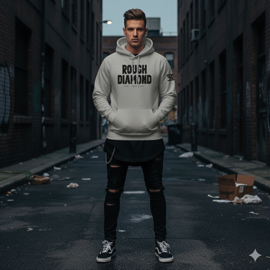 Man wearing a 'Rough Diamond' hoodie in an urban alleyway