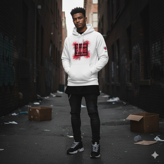 Person wearing a white hoodie with red graphics in an urban alleyway.