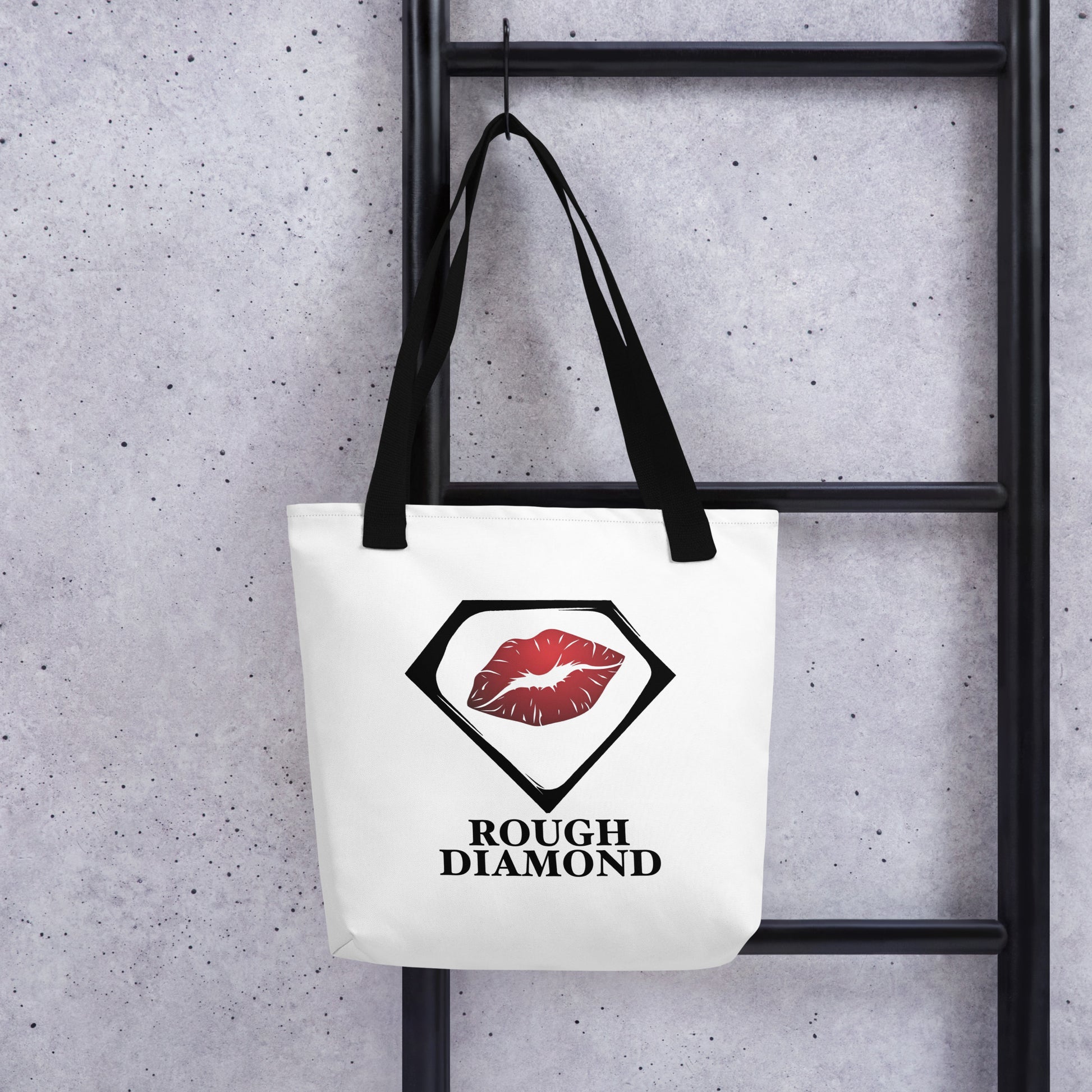 white tote bag with Rough diamond logo hanging on ladder
